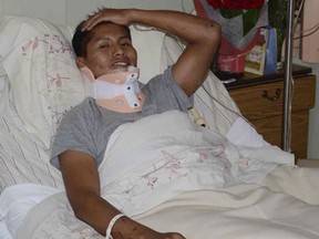 Erwin Tumiri lies in bed at a clinic in Cochabamba, Bolivia, Saturday, Dec. 3, 2016, after surviving the plane crash that killed the majority of the Brazilian soccer team Chapecoense. (AP Photo/Diego Cartagena)