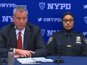 New York Mayor de Blasio and NYPD officer Aml Elsokary. (NYPDNews.com screengrab)