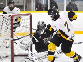 Tristan Beehler (7) of the Mitchell Midget LL team scores from close range during WOAA regular season action against Blyth-Brussels last Monday, Nov. 28, one of five first period goals en route to a 9-5 win. ANDY BADER MITCHELL ADVOCATE