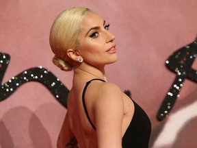 US singer Lady Gaga poses for pictures on the red carpet upon arrival to attend the British Fashion Awards 2016 in London on December 5, 2016. / AFP PHOTO / Daniel LEAL-OLIVASDANIEL LEAL-OLIVAS/AFP/Getty Images