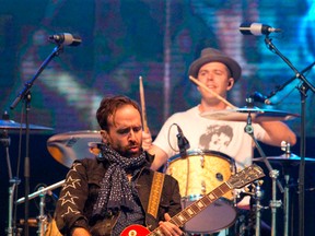 The Trews guitarist John-Angus MacDonald and drummer Sean Dalton play for an enthusiastic crowd at the Western Fair in 2014. The Trews are in London Friday, supporting their latest album Time Capsule, a greatest hits release that includes four new songs. (CRAIG GLOVER, The London Free Press)