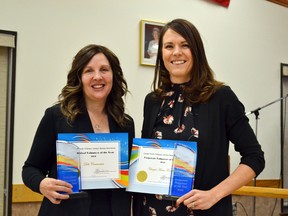 Deb Courvoisier (left) and Dalene Pilat hold their awards for Volunteer of the Year and Corporate Volunteer of the Year, respectively, at the 2016 Volunteer Appreciation Breakfast, hosted by the Grande Prairie Volunteer Services Bureau at the Golden Age Centre on Monday December 5 in Grande Prairie. Pilat accepted the award on behalf of  Unique Home Concepts. (Kevin Hampson/Grande Prairie Daily Herald-Tribune)