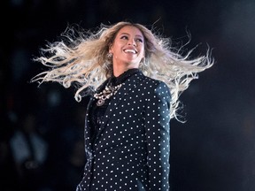 In this Nov. 4, 2016 file photo, Beyonce performs at a Get Out the Vote concert for Democratic presidential candidate Hillary Clinton in Cleveland. The pop star is the leader of the 2017 Grammys with nine nominations, including bids for album of the year with “Lemonade,” and song and record of the year with “Formation,” announced Tuesday, Dec. 6. The singer, who already has 20 Grammys, is also the first artist to earn nominations in the pop, rock, R&B and rap categories in the same year. (AP Photo/Andrew Harnik, File)