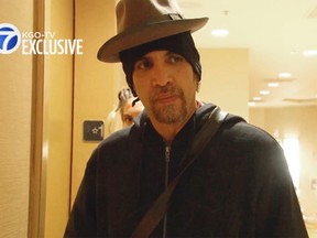 This still frame from exclusive video provided by San Francisco TV station KGO-TV, made late Sunday, Dec. 4, 2016, shows Derick Ion Almena, front, and Micah Allison, partly hidden behind him, the couple who operated the Ghost Ship warehouse where dozens have died in a fire, at the Oakland, Calif., Marriott Hotel. When a KGO reporter asked if he had anything to say to the families of those who were killed, Almena said: "They're my children. They're my friends, they're my family, they're my loves, they're my future. What else do I have to say?" (KGO-TV via AP)