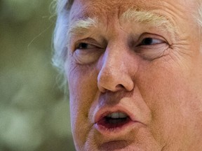 U.S. President-elect Donald Trump speaks with the media at Trump Tower on December 6, 2016 in New York. (EDUARDO MUNOZ ALVAREZ/AFP/Getty Images)