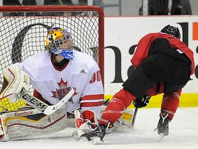Belleville's Kevin Bailie in action last year for the CIS All-Stars vs. Team Canada juniors. Bailie, of Queen's, returns to the national university All-Star squad for another two-game exhibition series against Canada as the juniors prepare for the upcoming WJC's in Montreal and Toronto. (CIS photo)