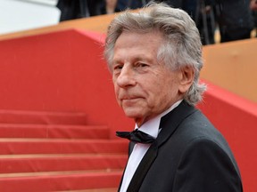 French-Polish director Roman Polanski arriving for the screening of "Vous n'avez encore rien vu !" (You ain't seen nothing yet !) presented in competition at the 65th Cannes film festival on May 21, 2012 in Cannes. (AFP PHOTO/ALBERTO PIZZOLIALBERTO)