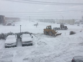 Up to 30 centimetres of snow was expected to fall in Winnipeg on Tuesday during the day, with another 10 centimetres forecast for the evening. (DOUG LUNNEY/WINNIPEG SUN)