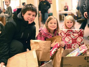 Children were welcomed to pick out presents for their family members for Christmas at the St. Thomas Anglican Church last weekend.(Shaun Gregory/Huron Expositor)