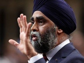 Defence Minister Harjit Sajjan stands in the House of Commons during question period on Parliament Hill in Ottawa, Monday, December 5 , 2016. (THE CANADIAN PRESS/Fred Chartrand)