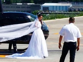 Rosemere do Nascimento Silva is seen in front of the helicopter that crashed on the way to her wedding.