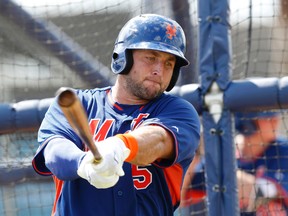 In a Sept. 20, 2016 file photo, Tim Tebow practices his swing during batting practice, in Port St. Lucie, Fla. (AP Photo/Wilfredo Lee, File)