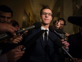 Nineteen-year-old Sam Oosterhoff speaks to members of the media before he is sworn in as the youngest-ever member of the Ontario legislature in Toronto on Wednesday, November 30, 2016. The Progressive Conservative was elected Nov. 17 in a byelection in Niagara West-Glanbrook, previously held by former party leader Tim Hudak. (THE CANADIAN PRESS/Christopher Katsarov)