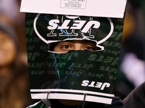 A New York Jets fan wears a bag on his head after they were defeated by the Indianapolis Colts at MetLife Stadium on Dec. 5, 2016 in East Rutherford, New Jersey. (Al Bello/Getty Images)