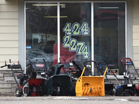 Snowblowers are ready for action along 118 Ave. near 123 St., with snow forecasted for Edmonton and area, Thursday, October 13, 2016. The blowers are for sale outside a pawn shop. Ed Kaiser/Postmedia