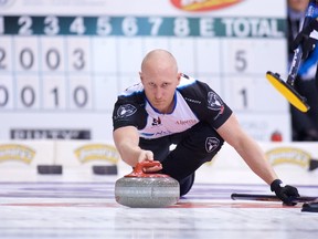 Brad Jacobs delivers a shot