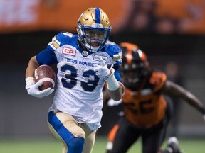 Bomber running back Andrew Harris carries the ball against the B.C. Lions during last month's playoff game. On Wednesday, Harris was named a CFL all-star. (THE CANADIAN PRESS/Darryl Dyck file photo)