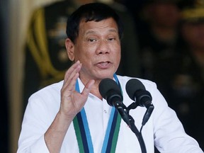 Philippine President Rodrigo Duterte addresses troops during change-of-command ceremony at Camp Aguinaldo in Quezon city, northeast of Manila, Philippines Wednesday, Dec. 7, 2016. (AP Photo/Bullit Marquez)