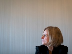 Alberta Premier Rachel Notley pauses to look out a window at Coal Harbour during an interview in Vancouver, B.C., on Tuesday December 6, 2016. THE CANADIAN PRESS/Darryl Dyck