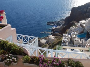 Santorini's beautiful Oia is home to cafes, boutique hotels and art gallerys taking advantage of its amazing views, some 260 metres above sea level. (BARBARA TAYLOR, London Free Press)