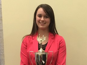 Lakeland College agribusiness student Jess Verstappen with award from the Canadian National 4-H and Youth Judging Competition last month. Submitted photo.