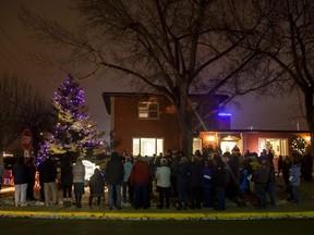 People from all over Vermilion and area gathered outside Crossroads Funeral Chapel for their first annual Tree of Remembrance on Thursday, December 1, 2016, in Vermilion, Alta.  The ceremony offered comfort to those who wanted to remember passed loved ones this holiday season. Taylor Hermiston/Vermilion Standard/Postmedia Network.