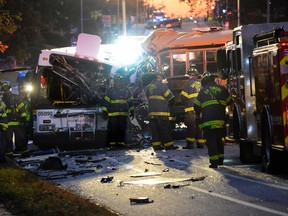 In this Tuesday, Nov. 1, 2016, file photo, fire department and rescue officials work at the scene of an early morning fatal collision between a school bus and a commuter bus in Baltimore. National investigators said the driver of the Baltimore school bus, Glen Chappell, that careened into a transit bus, killing six people, including himself, was speeding and had a history of crashes and seizures, in its initial report Wednesday, Dec. 7. (Jeffrey F. Bill/The Baltimore Sun via AP, File)