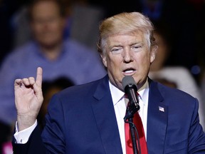 President-elect Donald Trump speaks to supporters during a rally in Fayetteville, N.C., Tuesday, Dec. 6, 2016. (AP Photo/Gerry Broome)