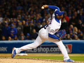In this Oct. 30, 2016, file photo, Chicago Cubs relief pitcher Aroldis Chapman throws during the seventh inning of Game 5 of the Major League Baseball World Series against the Cleveland Indians, in Chicago. (AP Photo/Nam Y. Huh, File)