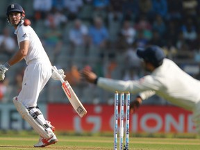 England's captain Alastair Cook bats on the first day of the fourth cricket test match between India and England in Mumbai, India, on Thursday. (AP/PHOTO)
