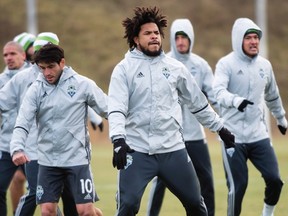 Seattle Sounders defender Roman Torres warms up with his team during practice ahead of the championship final match against Toronto FC in Toronto on Dec. 8, 2016. (THE CANADIAN PRESS/Nathan Denette)