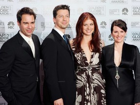 In this Jan. 16, 2006 file photo, cast members from the comedy series "Will & Grace," from left, Eric McCormack, Sean Hayes, Debra Messing and Megan Mullally, pose backstage after making an award presentation at the 63rd Annual Golden Globe Awards in Beverly Hills, Calif. (AP Photo/Reed Saxon, File)
