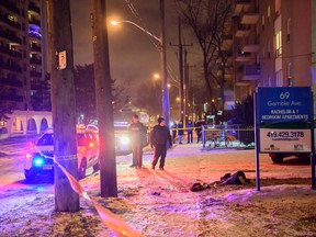 Toronto Police at the scene of a double stabbing Thursday, Dec. 8, 2016 on Gamble Ave. near Pape Ave. (Victor Biro/Special to the Toronto Sun)