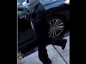 A surveillance video image of the man sought in the shooting of Marcus Gibson at his home on Munro St., near Dundas St. E. and Broadview Ave., Nov. 28, 2016.