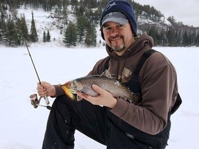 This brookie slammed a hair jig bounced around in less than six feet of water. Photo supplied.