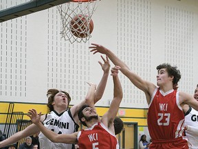 Glendale's Duncan McLean (left) rebounds against WCI on Tuesday. (CHRIS ABBOTT/TILLSONBURG NEWS)