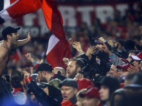 Toronto FC fans celebrate a second-half goal against the Montreal Impact during the MLS Conference Finals, Game 2 at BMO field in Toronto on Nov. 30, 2016. (Dave Abel/Toronto Sun)