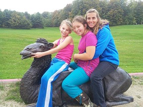 Teri Winter enjoys happier times with her daughters Mikayla (left) and Jordan.