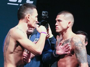 UFC fighter Max Holloway and Anthony Pettis at the Air Canada Centre in Toronto on Dec. 9, 2016. (Veronica Henri/Toronto Sun/Postmedia Network)