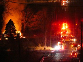 Brampton Fire crews battle a blaze at a vacant house on Heritage Rd. that broke out around 11:15 p.m. on Dec. 9, 2016. (Pascal Marchand/Special to the Toronto Sun)