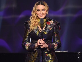 Madonna speaks on stage at the Billboard Women in Music 2016 event on Dec. 9, 2016 in New York City. (Photo by Nicholas Hunt/Getty Images for Billboard Magazine)
