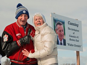 Carol Hutchinson embraces Walter Gretzky following a sign unveiing on Saturday December 10, 2016 in the village of Canning, west of Brantford, Ontario. The sign, erected at the edge of the village where he grew up, bears a photo of him with the wording "Canning: The birthplace of Canada's #1 Hockey Dad Walter Gretzky." Hutchinson attended Canning School with Gretzky, in a one-room schoolhouse where the teacher had 30 children ranging from kindergarten to grade 8. Brian Thompson/Brantford Expositor/Postmedia Network