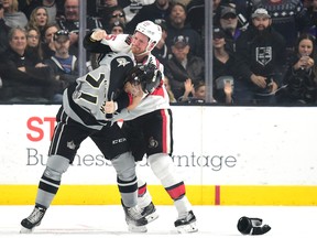 Senators winger Chris Neil fights Jordan Nolan of the Los Angeles Kings on Dec. 10. (Getty Images)