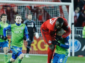 TFC's Jozy Altidore and Osvaldo Alonso of Seattle as Toronto FC hosts Seattle Sounders for the MLS Cup at BMO Field in Toronto, Ont. on Saturday December 10, 2016. Michael Peake/Toronto Sun/Postmedia Network