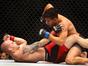 Matthew Lopez fights Mitch Gagnon during UFC 206 at the Air Canada Centre in Toronto on Saturday December 10, 2016. Dave Abel/Toronto Sun/Postmedia Network