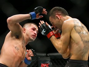 Max Holloway (right) defeated Anthony Pettis (left) during the main card of UFC 206 at the Air Canada Centre in Toronto on Saturday, Dec. 11, 2016. (Dave Abel/Toronto Sun)