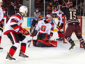 Ottawa 67's goalie Olivier Lafreniere watches the puck go into his net against the Peterborough Petes at TD Place Arena on Sunday. (Ashley Fraser/Postmedia Network)