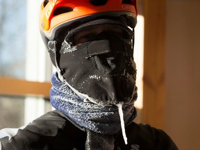 Stephen Formstone takes a break to warm up and discovers he has an icicle coming out of his balaclava during a ride in the 45NRTH Fatbike Triple Crown race on Sunday, December 11, 2016  in Edmonton.  Riders choose one of three races to ride in, a 4 , 3 or a 2 hour race and the winner finishs the most laps in there time category. Greg  Southam / Postmedia