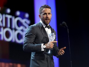 Actor Ryan Reynolds accepts the Entertainer of the Year award onstage during The 22nd Annual Critics' Choice Awards at Barker Hangar on December 11, 2016 in Santa Monica, California. (Photo by Christopher Polk/Getty Images for The Critics' Choice Awards )