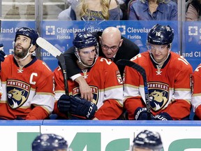 Florida Panthers' Seth Griffith (24) of Wallaceburg listens to head coach Tom Rowe in the first period Saturday against the Vancouver Canucks in Sunrise, Fla. Griffith played on the Panthers' top line and had one assist in a 4-2 win. (ALAN DIAZ/The Associated Press)